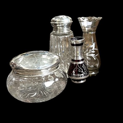 Lot 195 - A silver-topped sugar sifter and dressing...