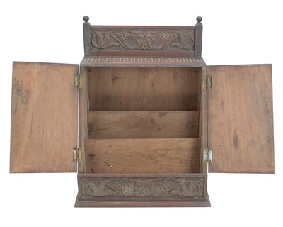 Lot 56 - A teak stationery or correspondence cabinet, circa 1900.