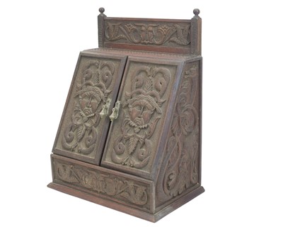 Lot 56 - A teak stationery or correspondence cabinet, circa 1900.