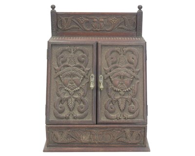 Lot 56 - A teak stationery or correspondence cabinet, circa 1900.