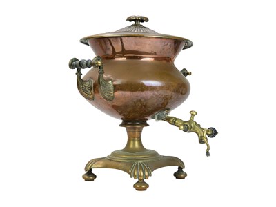 Lot 60 - A 19th century copper samovar with scrolled twin handles.