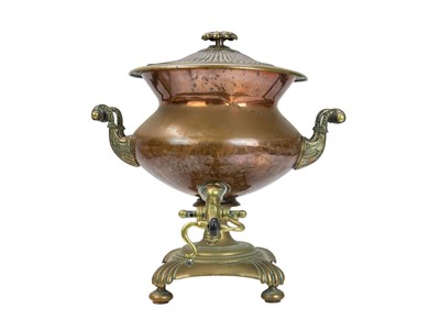Lot 60 - A 19th century copper samovar with scrolled twin handles.