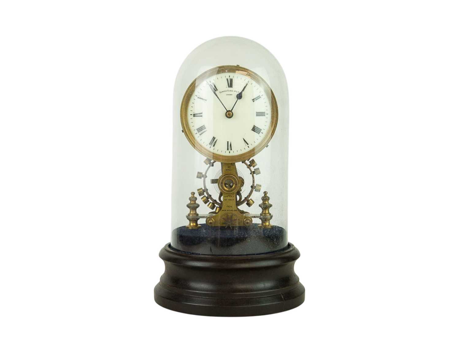 Lot 786 - An electric Eureka mantel clock under a glass dome.