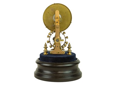 Lot 786 - An electric Eureka mantel clock under a glass dome.