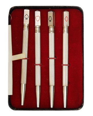 Lot 161 - A sterling silver and enamel set of four Bridge propelling pencils.