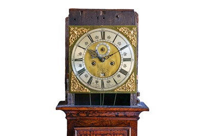 Lot 792 - A walnut and marquetry inlaid eight day longcase clock.