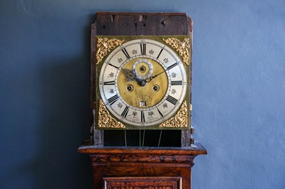Lot 792 - A walnut and marquetry inlaid eight day longcase clock.
