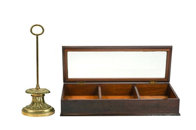 Lot 161 - A Victorian brass doorstop.