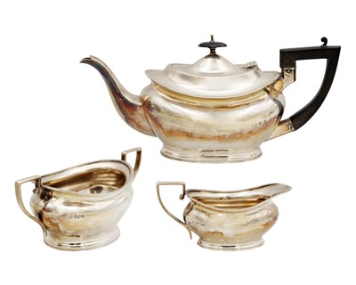 Lot 184 - A George V silver three-piece tea set by Cooper Brothers & Sons Ltd.