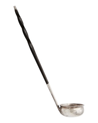 Lot 185 - A Georgian silver and twisted baleen handle toddy ladle.
