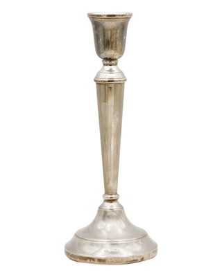 Lot 151 - A modern silver-filled candlestick.