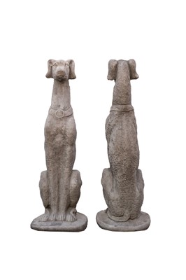 Lot 764 - A pair of large cast stone sculptures of seated whippets.