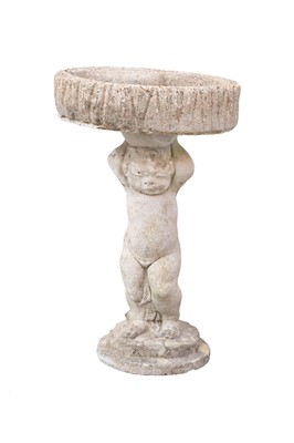 Lot 746 - A reconstituted stone birdbath of small proportions.