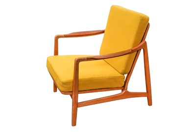 Lot 664 - A France & Daverkosen, Denmark, stained beech lounge chair.