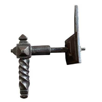 Lot 153 - A Gothic door handle in forged steel.