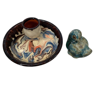 Lot 158 - A slipware bowl, 18cm across, and a pottery bird.