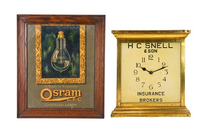 Lot 787 - An advertising light-up wall clock.