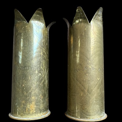 Lot 183 - A pair of WWI decorated German trench art...