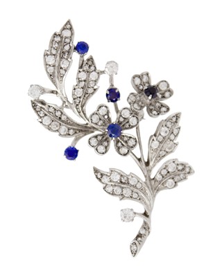 Lot 211 - An attractive silver flower spray brooch set with synthetic spinels.