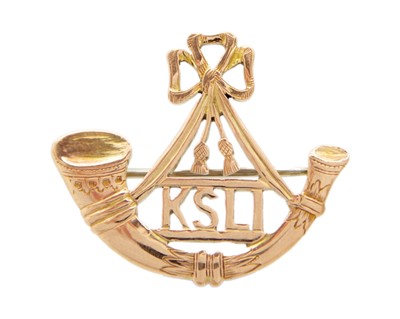 Lot 210 - A 9k gold King's Shropshire Light Infantry sweetheart brooch.