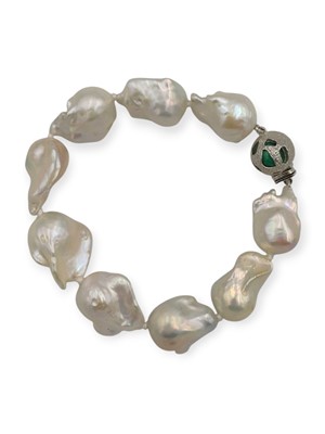Lot 45 - A large cultured freshwater baroque pearl bracelet fitted with a silver and malachite clasp.