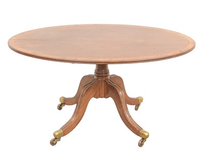 Lot 918 - A Regency style mahogany and crossbanded oval coffee table.