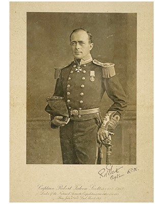 Lot 26 - A black and white lithograph portrait of Captain Robert Falcon Scott in Naval uniform.