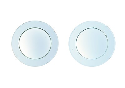 Lot 832 - A pair of convex wall mirrors.