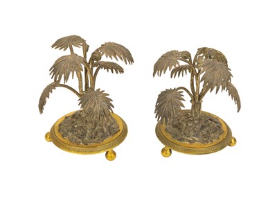 Lot 9 - A pair of silver plated and gilt metal palm tree table ornaments.