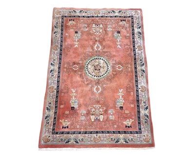 Lot 459 - A Chinese carpet.