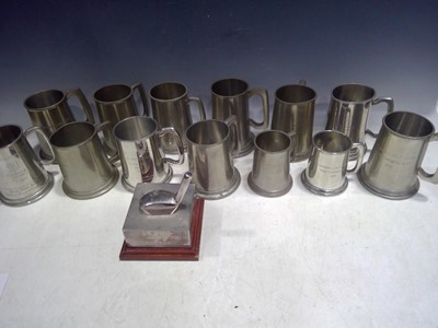 Lot 219 - Pewter Golf Tankards.