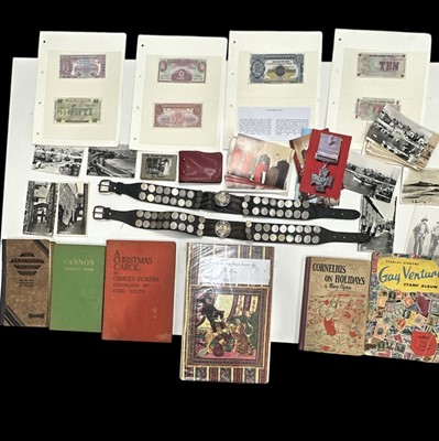 Lot 224 - A mixed lot of postcards, military money,...