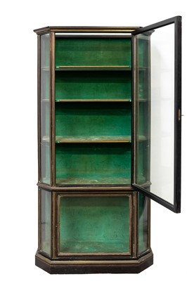 Lot 862 - A brass mounted ebonised display cabinet.