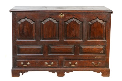 Lot 943 - An 18th century oak mule chest.