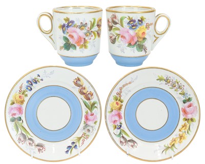 Lot 594 - A substantial pair of French porcelain cups and saucers.