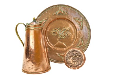 Lot 182 - An Arts and Crafts circular copper dish.