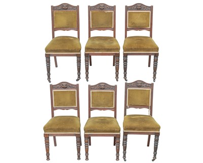 Lot 860 - A set of six late Victorian oak dining chairs.