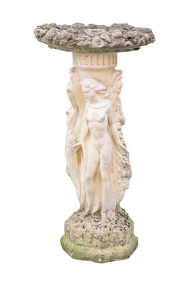 Lot 761 - A cast stone bird bath, the figural column modelled with the three graces.