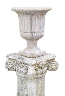 Lot 778 - A cast stone fluted urn.