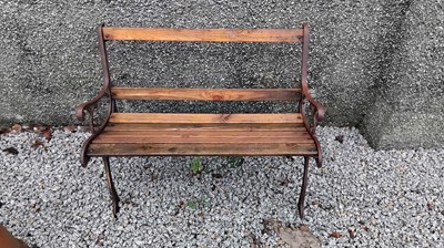 Lot 869 - A garden bench of small proportions.