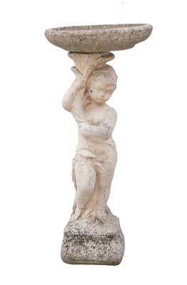 Lot 769 - A composition stone bird bath, the figural column modelled as a putto holding a cornucopia aloft.