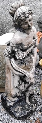 Lot 747 - A reconstituted stone figure of a maiden holding a spouted urn.