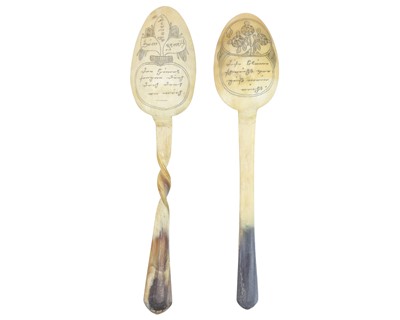 Lot 76 - Two German horn love spoons.