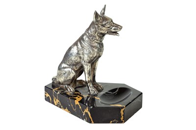Lot 134 - A French silver plated model of a seated German Shepherd dog.