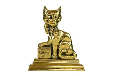 Lot 116 - A late Victorian brass door stop.