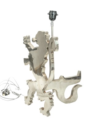 Lot 95 - A pair of bespoke lion passant nickel table lamps.