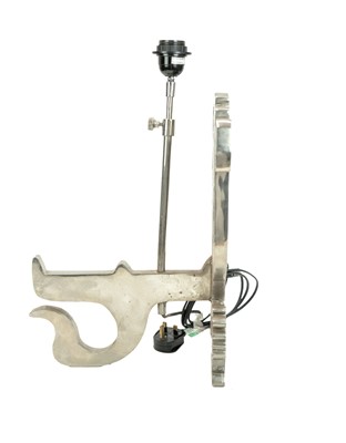 Lot 95 - A pair of bespoke lion passant nickel table lamps.