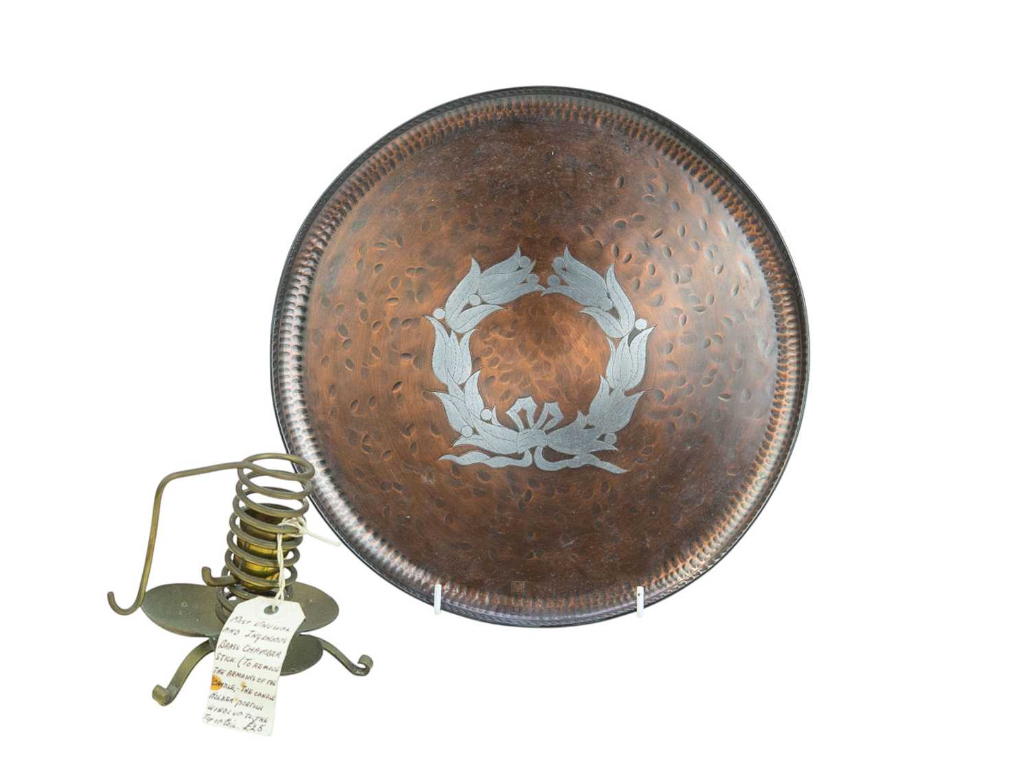 Lot 46 - A Victoria House copper and pewter inlaid salver.