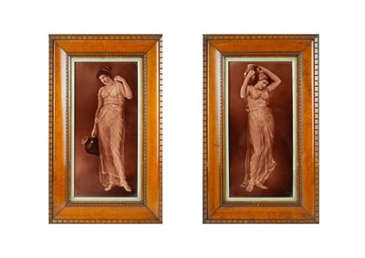 Lot 557 - A pair of framed 'water carrier' tiles.