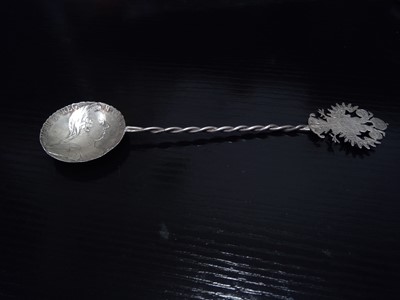 Lot 5 - A Russian Silver Thaler Spoon. The Spoon is...